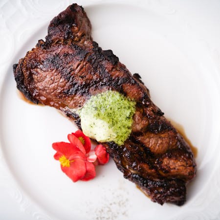 Sous Vide New York Strip Steak with Herbed Butter Sauce